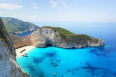 Santorini, Greece’s picturesque island known for sunsets and whitewashed cliffs.