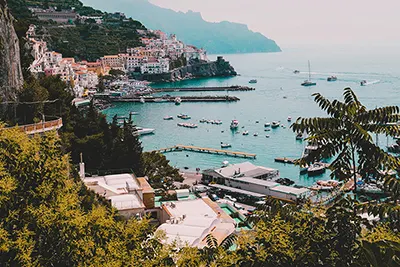 Amalfi Coast, Italy’s scenic coastline dotted with cliffs, beaches, and colorful towns.