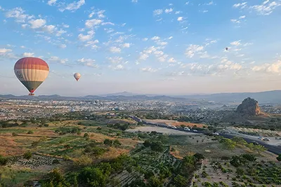 Cappadocia, Turkey’s fairytale region known for hot-air balloons and cave dwellings.