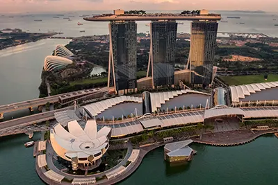 Singapore, a modern city-state blending futuristic skyline with lush green spaces.